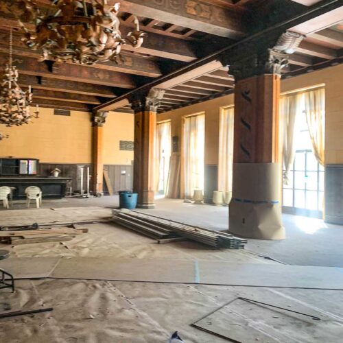 Interior ballroom with large chandeliers being remodeled