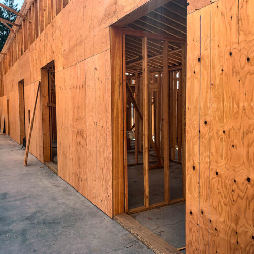 Wooden sidewalls on a new construction build