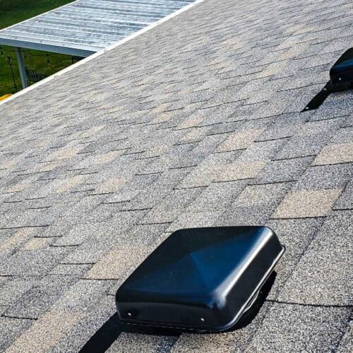 Skylight on a shingled roof