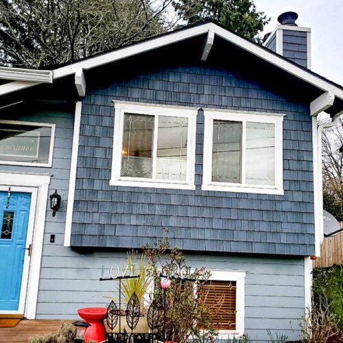 Blue colored cedar wood shingles on a house