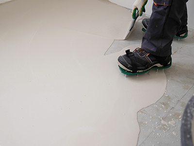 concrete epoxy being poured in the pacific northwest | American Mastercraft